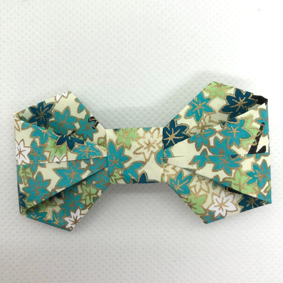Barrette avec nœud en origami bleu turquoise